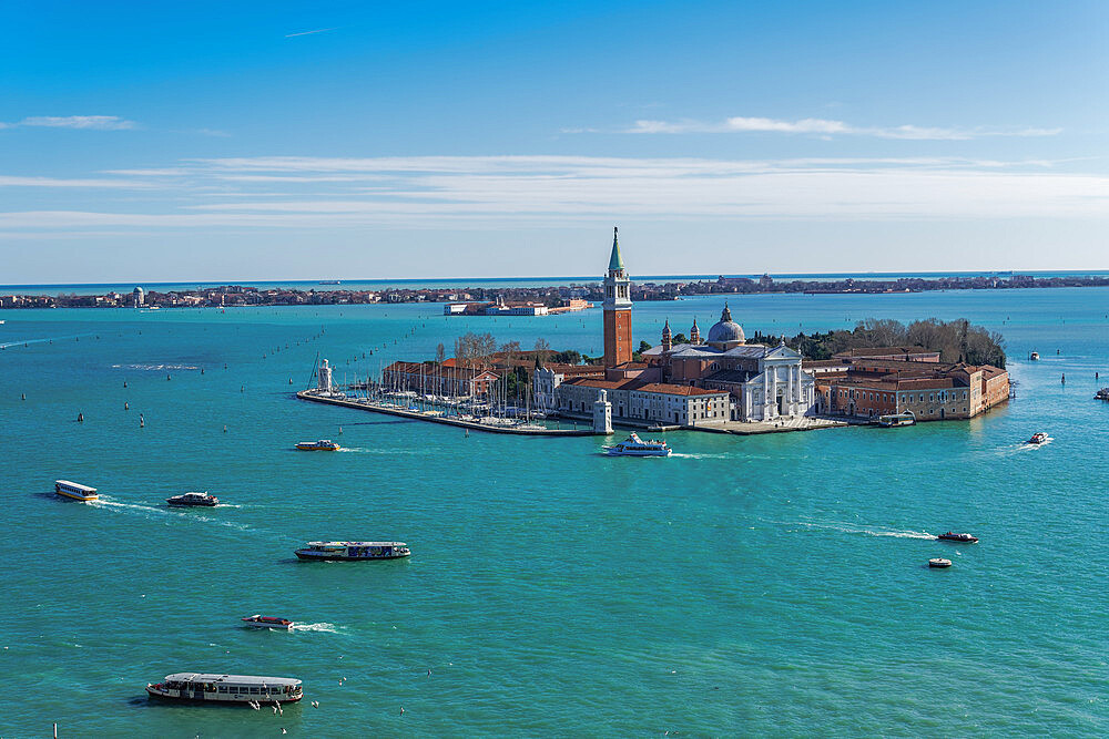 Day view of San Giorgio Maggiore Island with church at Venetian lagoon, with Lido background view, Venice, UNESCO World Heritage Site, Veneto, Italy, Europe