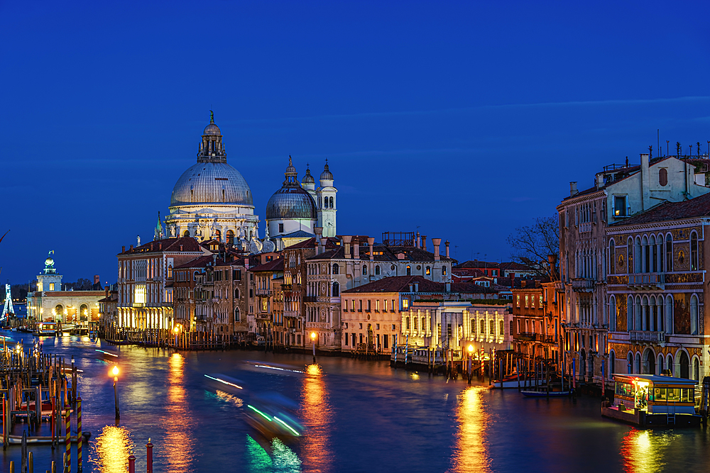 Grand Canal night view and buildings on Dorsoduro with Santa Maria Della Salute (Basilica of Saint Mary of Health), Venice, UNESCO World Heritage Site, Veneto, Italy, Europe