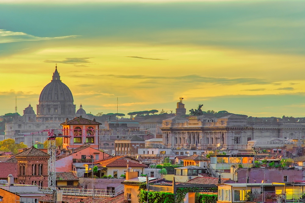 Rooftops landscape panorama with traditional low-rise buildings and St. Peters Basilica dome, golden hour elevated view, Rome, Lazio, Italy, Europe