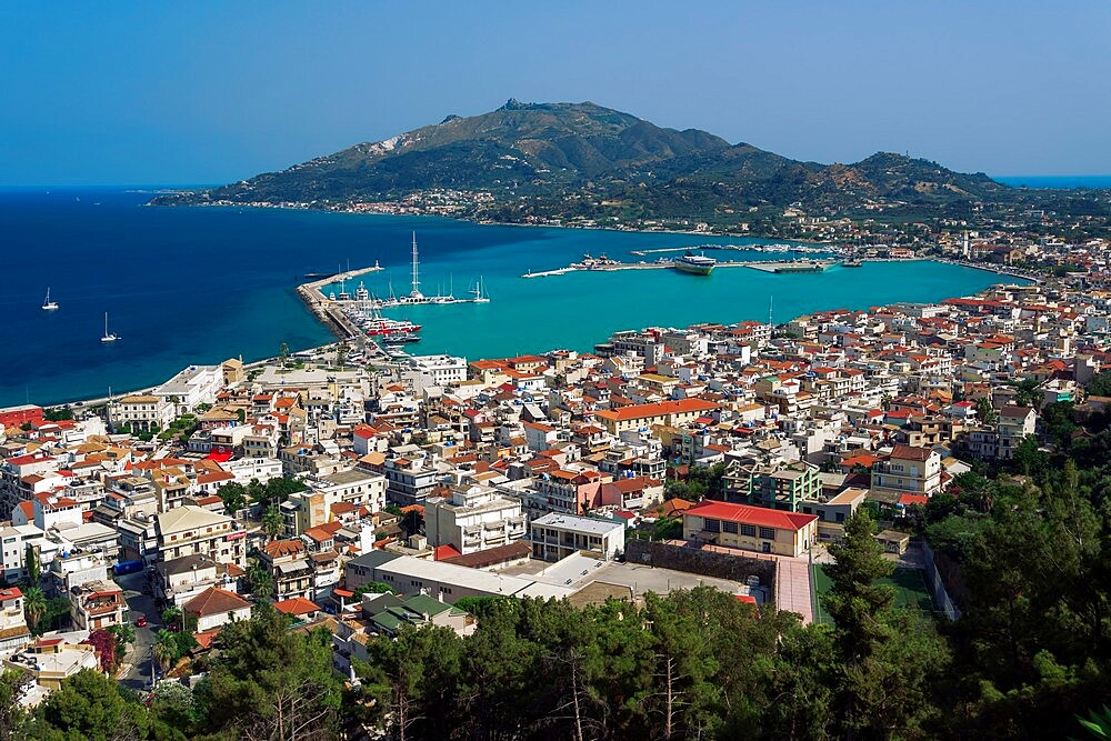 Zakynthos Town panorama with orange roof tiles low-rise buildings around the harbour, Zakynthos, Ionian Islands, Greek Islands, Greece, Europe