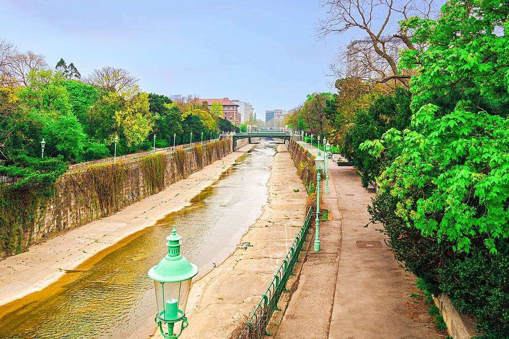 Wiental Kanal, a water canal with a pedestrian area running along Stadpark, a large municipal 19th century public place in Vienna, Austria, Europe