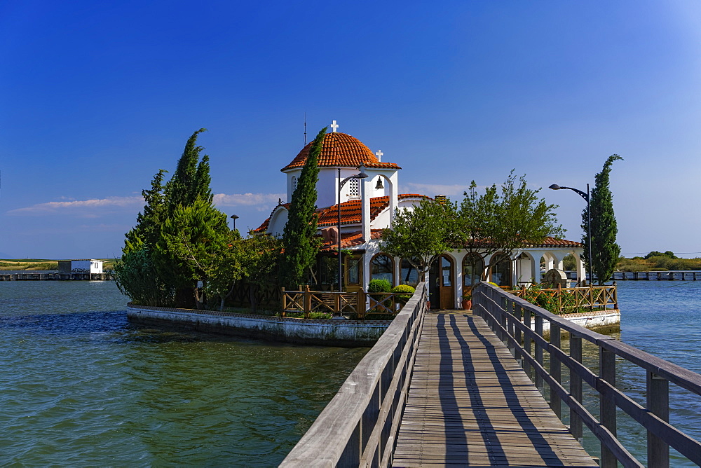 Greek Orthodox church at lagoon, Porto Lagos village pilgrimage of St. Nicholas, metochi of Athos Monastery in Vatopedi, Greece, Europe