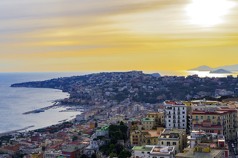 Panoramic sunset view of Mergellina coastal section seen from Sant Elmo castle in Naples, Campania, Italy, Europe