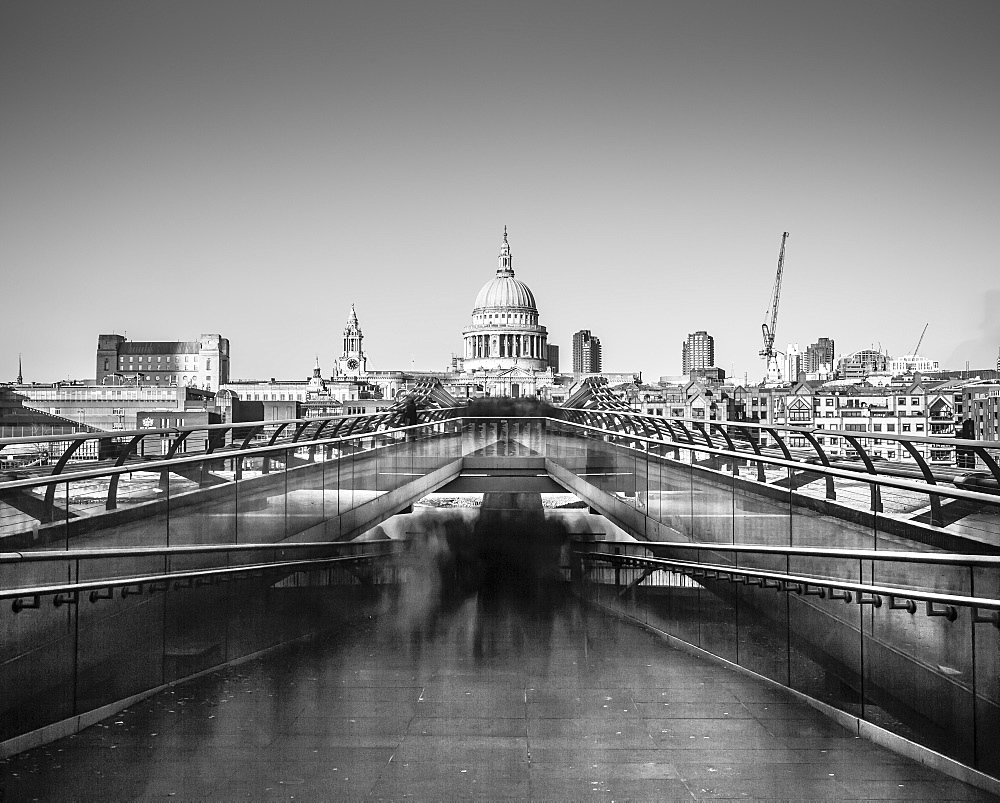 Ghostly figures going to work in long exposure image of St. Paul's from Millennium Bridge, City of London, London, England, United Kingdom, Europe