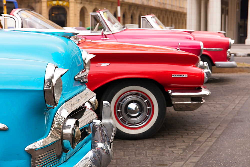 Colourful old Amerincan cars parked in Havana, Cuba, West Indies, Caribbean, Central America