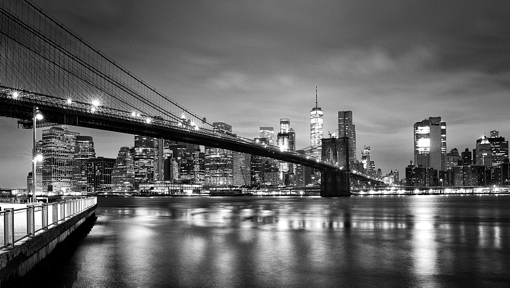 Brooklyn Bridge and Lower Manhattan skyline at dawn, New York City, New York, United States of America, North America