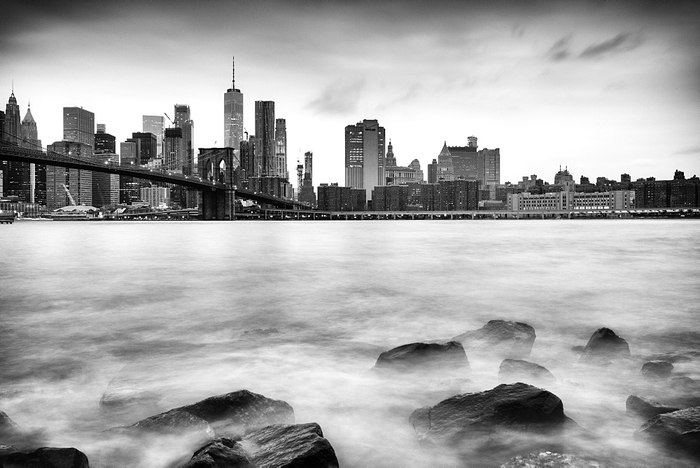 Brooklyn Bridge and Lower Manhattan skyline taken from Pebble Beach, New York City, New York, United States of America, North America