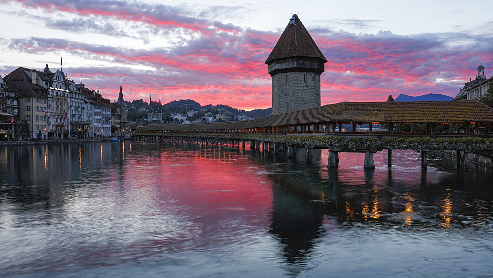 Sunrise view of the Kapellbrucke (Chapel Bridge) in Lucerne, Switzerland, Europe