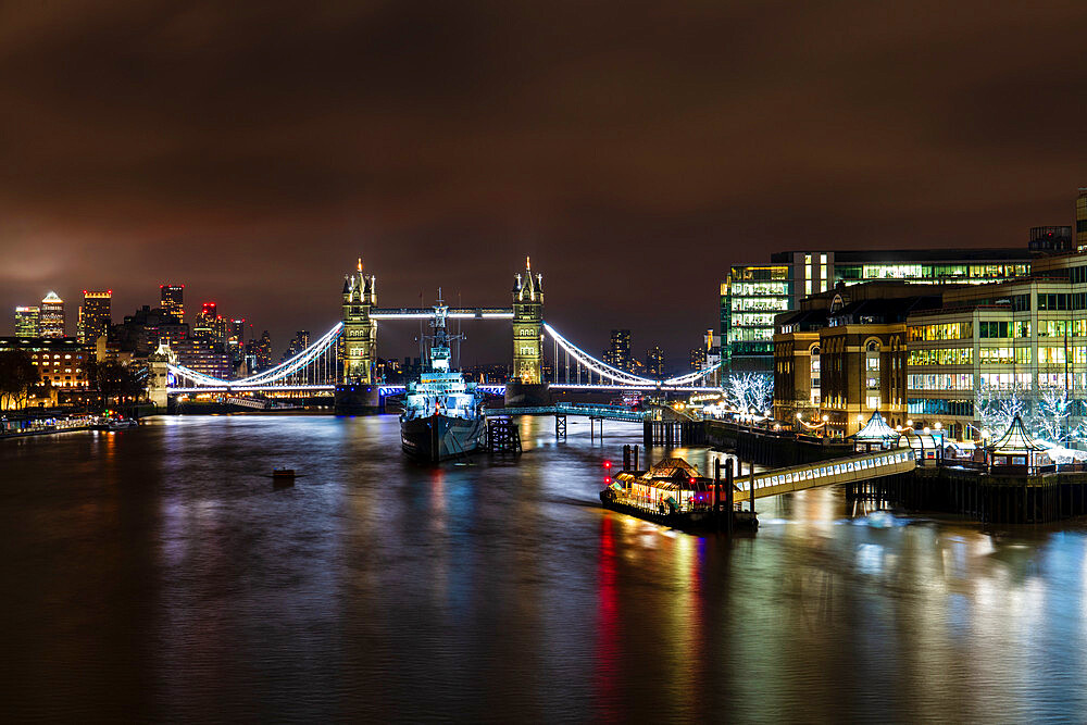 Tower Bridge and HMS Belfast on River Thames at night, London, England, United Kingdom, Europe