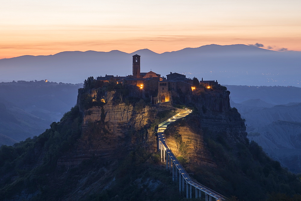 Civita di Bagnoregio, a medieval town perched on volcanic rock, just before sunrise, Lazio, Italy, Europe