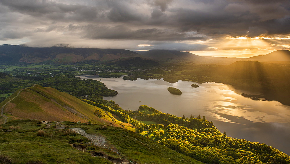 Sunrise over Derwentwater from the ridge leading to Catbells in the Lake District National Park, UNESCO World Heritage Site, Cumbria, England, United Kingdom, Europe