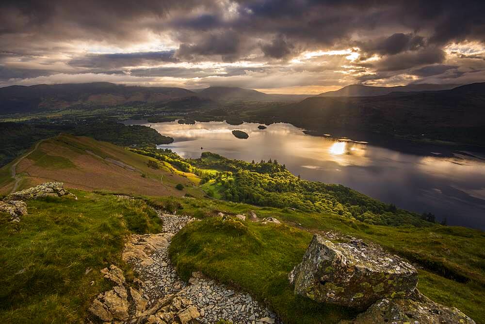 Sunrise over Derwentwater from the ridge leading to Catbells in the Lake District National Park, UNESCO World Heritage Site, Cumbria, England, United Kingdom, Europe