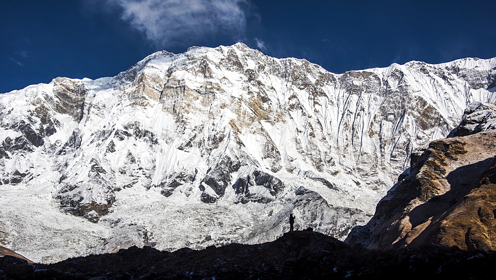 The silhouette of a photographer in front of Annapurna, Himalayas, Nepal, Asia