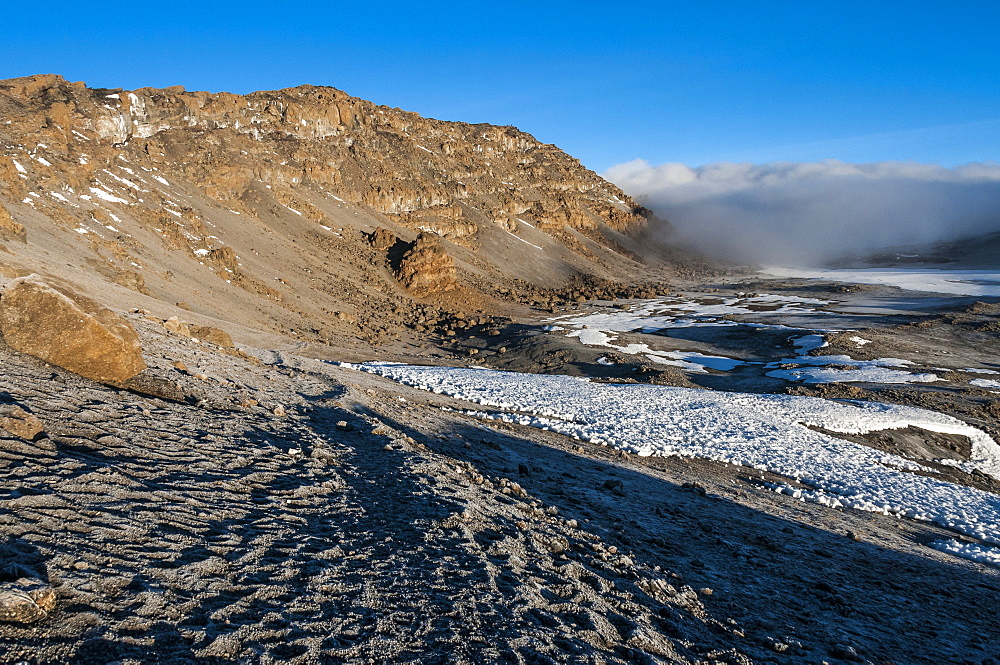 Inside the crater on the top of Mount Kilimanjaro with the highest point Uhuru Peak at the end of the ridge, UNESCO World Heritage Site, Tanzania, East Africa, Africa