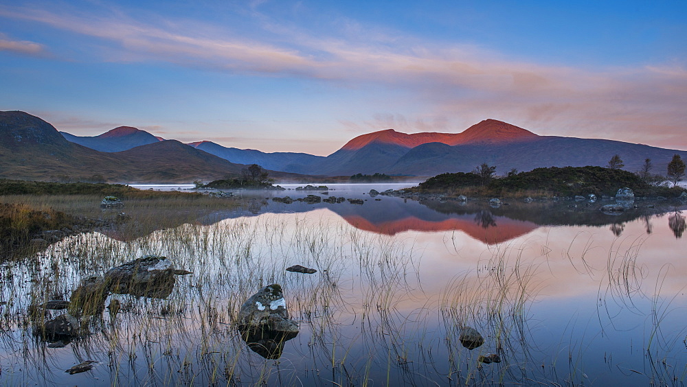 Lochan na h-Achlaise with the early morning light catching the Black Mount in the background, Rannoch Moor, Highlands, Scotland, United Kingdom, Europe