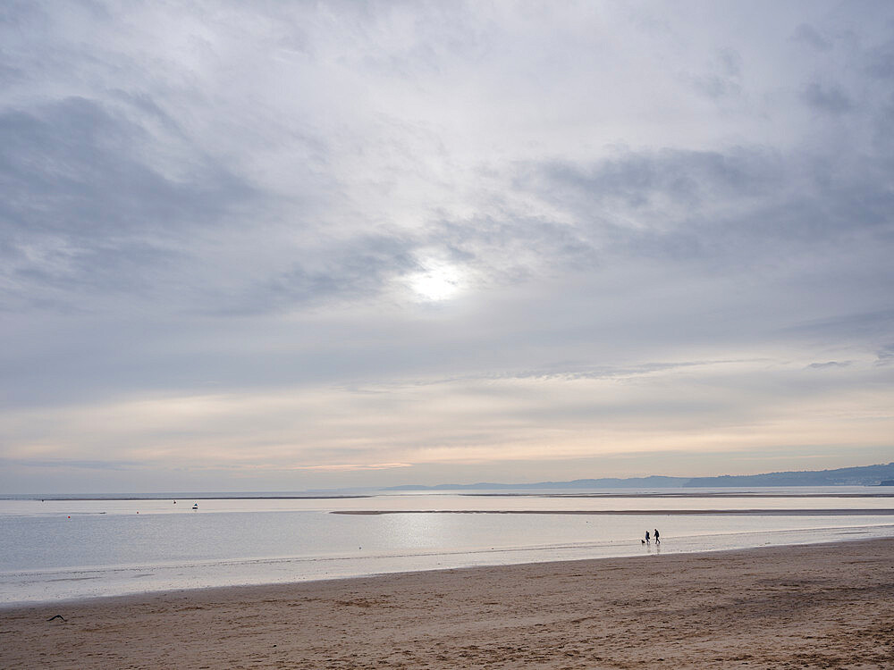 Tranquil scene in soft early afternoon light on Exmouth beach, Exmouth, Devon, England, United Kingdom, Europe