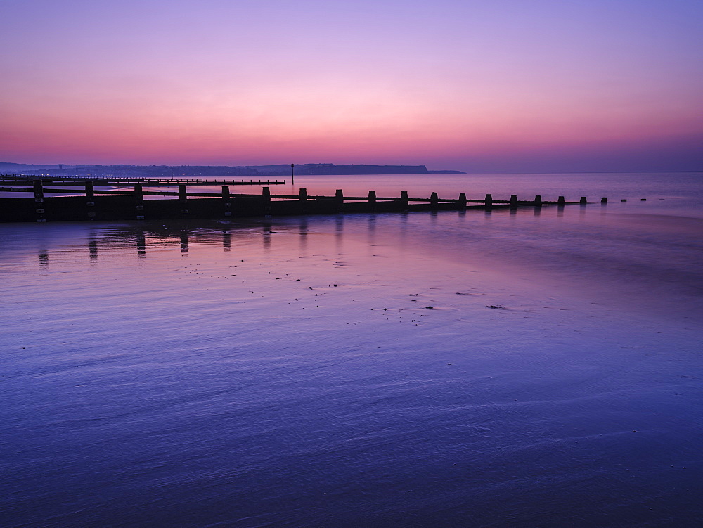 Early morning looking at Exmouth beyond the sea defences, Dawlish Warren, Devon, England, United Kingdom, Europe