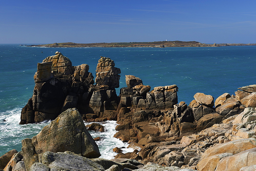 Granite rocks on a headland near Old Town, looking at Samsom, St. Mary's, Isles of Scilly, England, United Kingdom, Europe