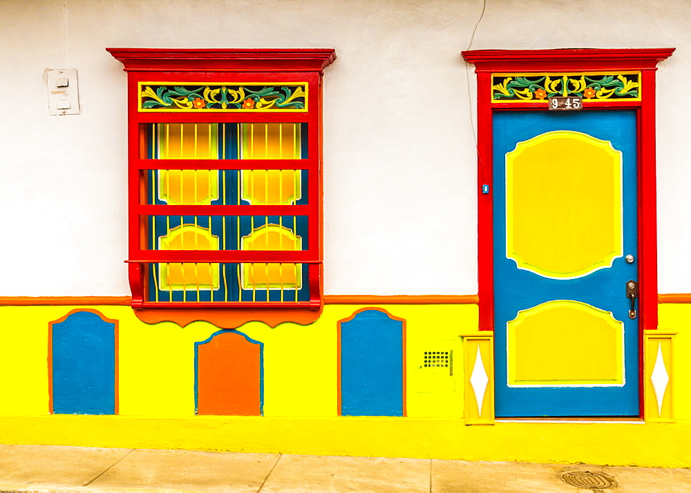 A view of a typical colourful preserved colonial building, Jardin, Colombia, South America