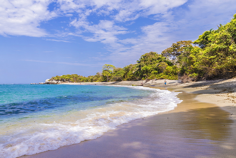 A view of a beach and the Caribbean sea in Tayrona National Park in Colombia, South America