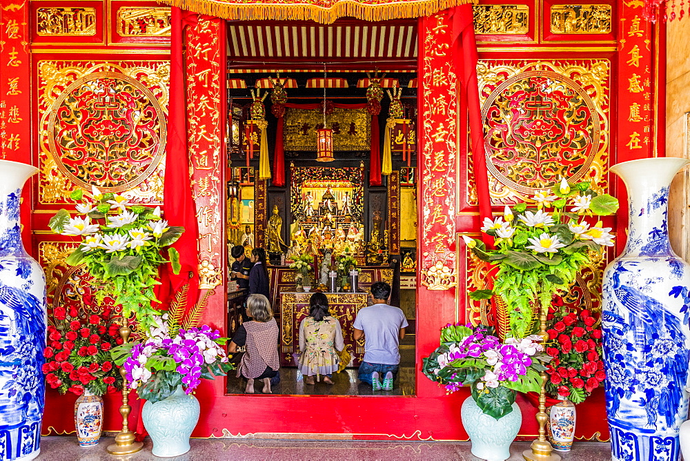 Praying at Jui Tui shrine in Phuket Old Town, Phuket, Thailand, Southeast Asia, Asia