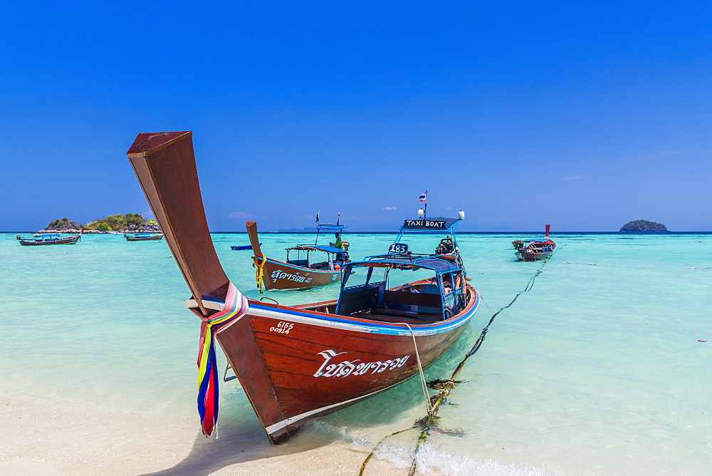 Colourful long tail boats on Ko Lipe island in Tarutao National Marine Park, Thailand, Southeast Asia, Asia