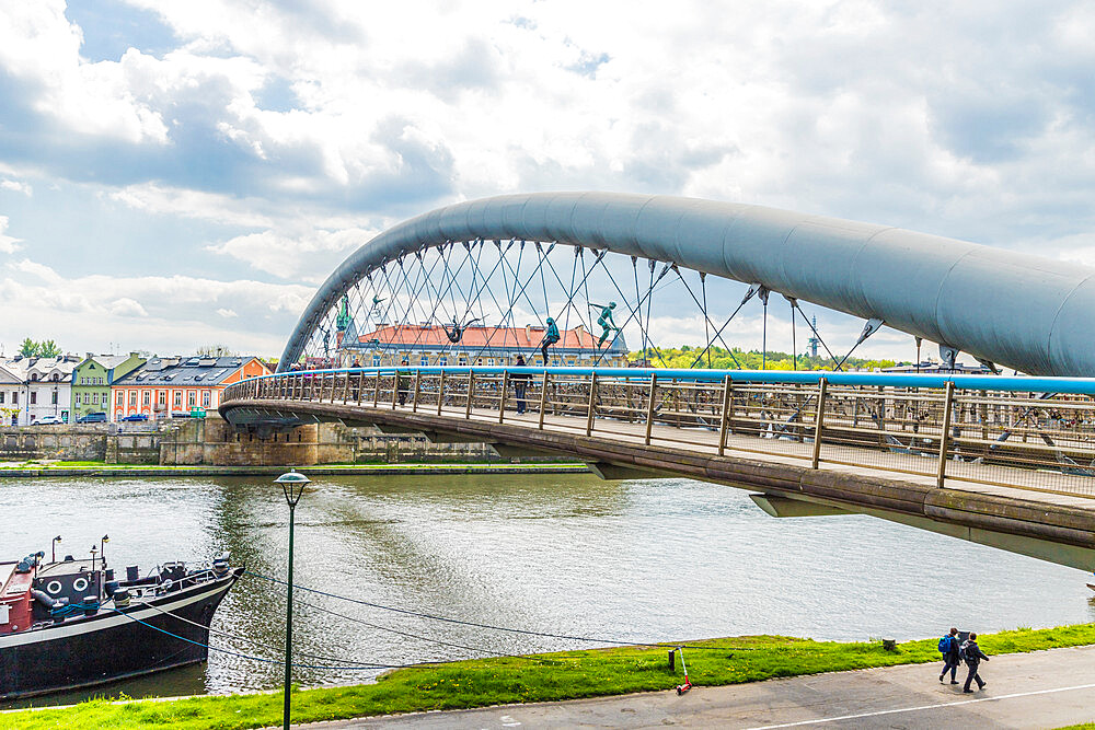 The Bernatka suspension foot bridge over the Wisla (Vistula) River in Krakow, Poland, Europe