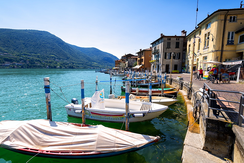 Boats moored at Monte Isola, the largest lake island in Europe, Province of Brescia, Lombardy, Italy, Europe