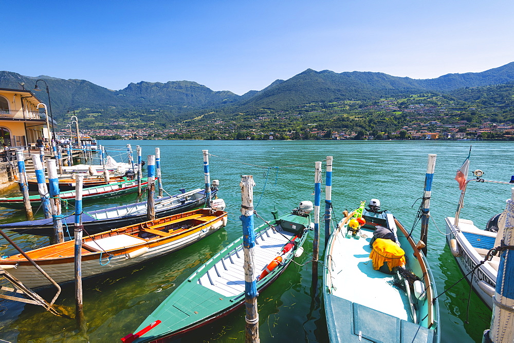 Boats moored at Monte Isola, the largest lake island in Europe, Province of Brescia, Lombardy, Italy, Europe