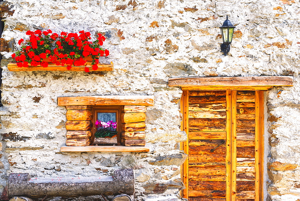 Facade of a mountain house in Alta Valtellina, Sondalo, Lombardy District, Italy, Europe