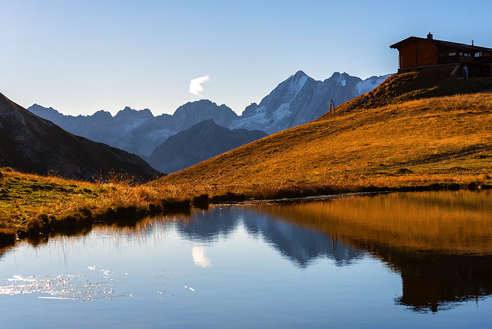 Presanella mirrored in Lake Bleis, Stelvio National Park, Brescia province, Lombardy, Italy, Europe