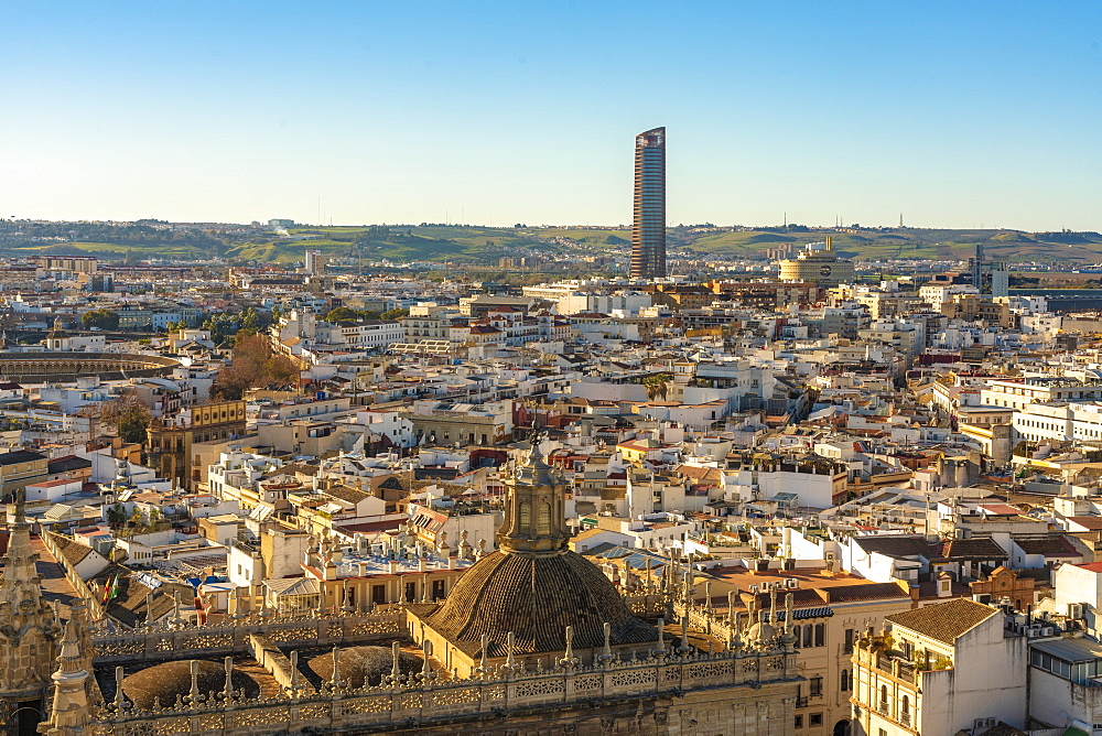 View of the historic center of Seville with Torre Sevilla (Tower of Seville) in the background, Seville, Andalucia, Spain, Europe