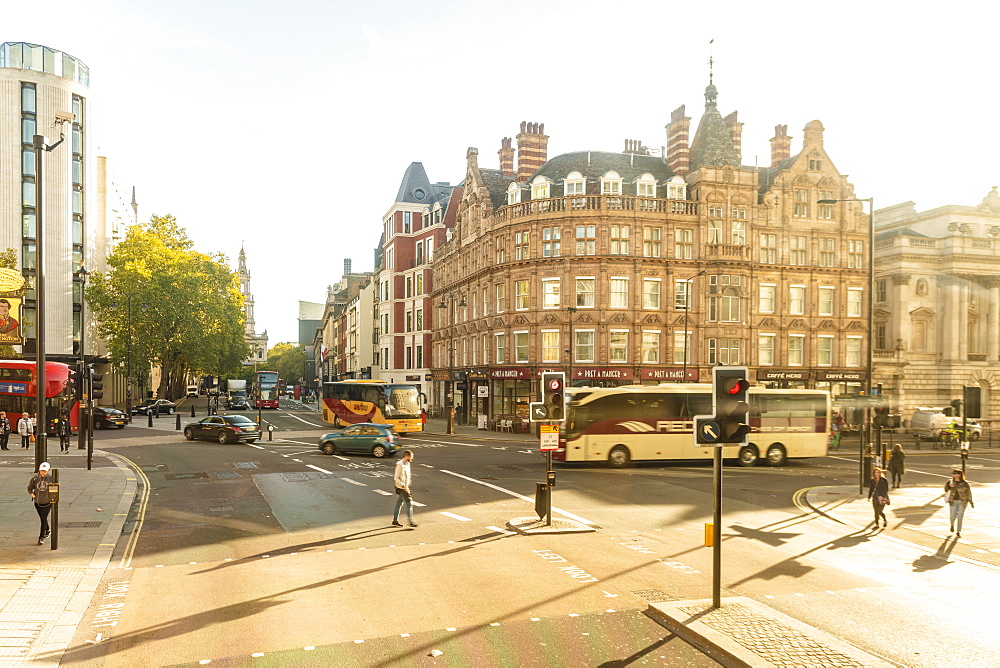 The Strand with the St. Clement Danes, Central Church of The Royal Air Force, in the background on a sunny day, London, England, United Kingdom, Europe