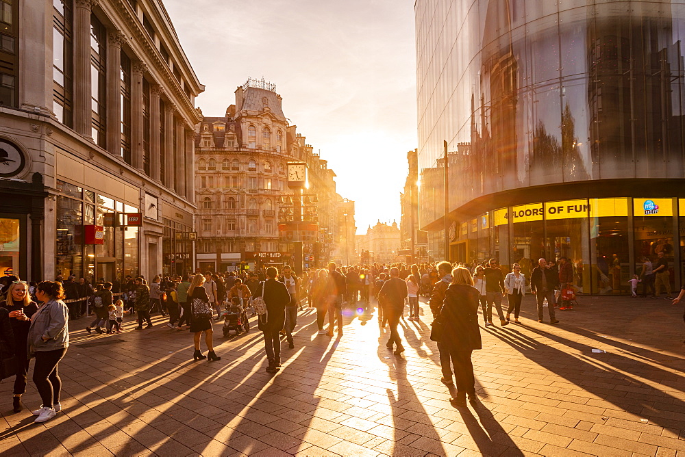 Leicester Street with Swiss Glockenspiel and backlight in late afternoon, London, England, United Kingdom, Europe