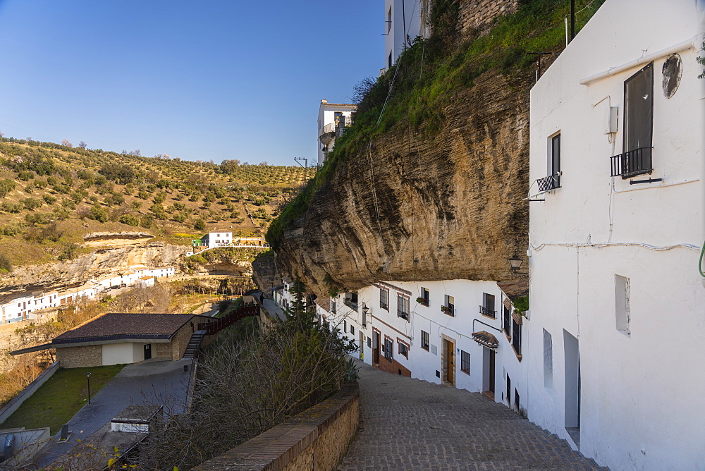 Setenil de las Bodegas with its white historic buildings and the houses under the rock mountain, Setenil de las Bodegas, Province of Cadiz, Spain, Europe