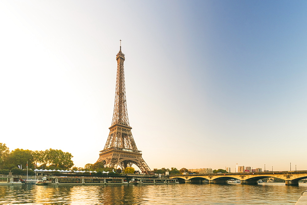 Eiffel Tower early in the morning viewed from the other side of the River Seine, Paris, France, Europe