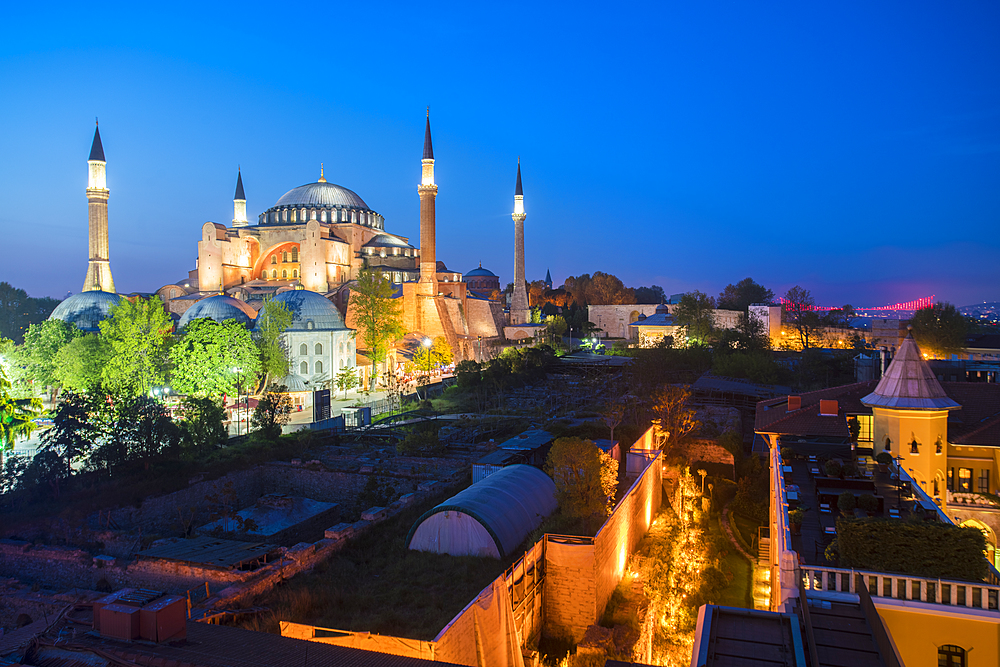 Hagia Sofia, UNESCO World Heritage Site, at night with the Four Seasons Hotel on the right, Istanbul, Turkey, Europe