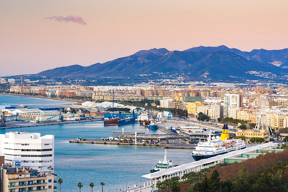 View from the view point of Gibralfaro by the castle over the harbor of Malaga at sunrise, Malaga, Andalusia, Spain, Europe