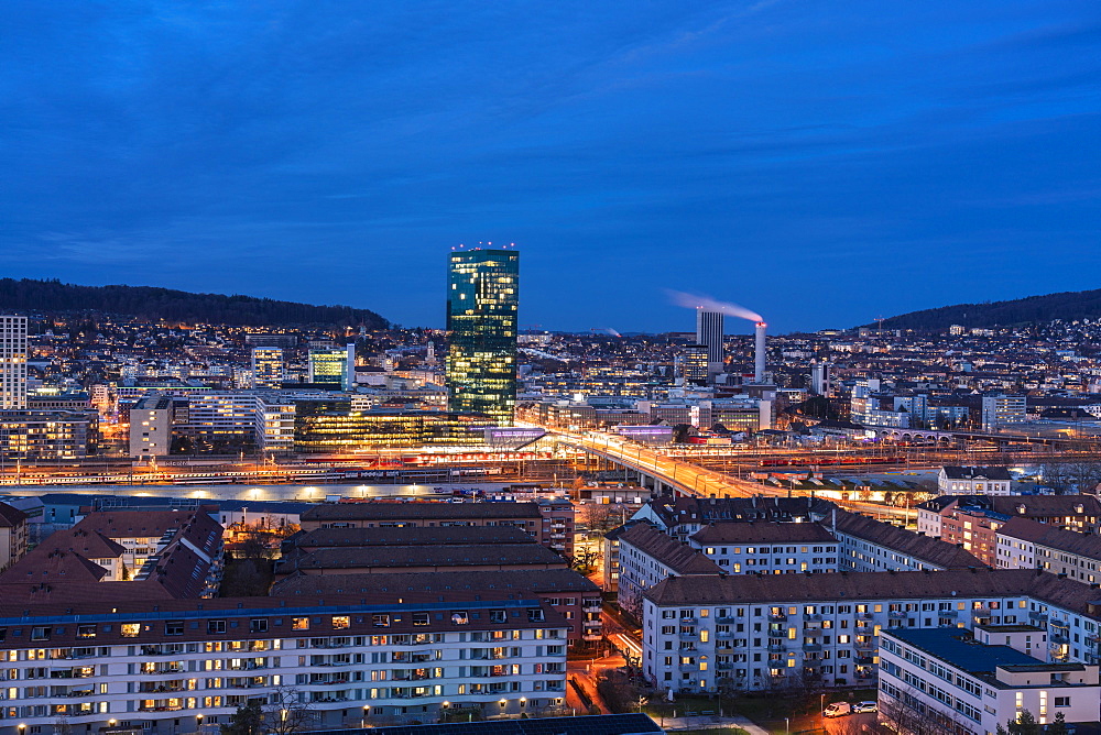 View of Zurich district 4 and 5 and Prime Tower, Hard Bridge from above at night, Zurich, Switzerland, Europe