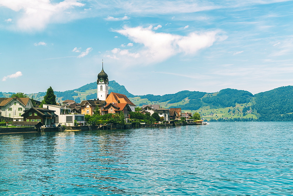 Beckenried village on Lucern Lake with the Catholic church of St. Heinrich seen in the middle, Beckenried, Nidwalden, Switzerland, Europe