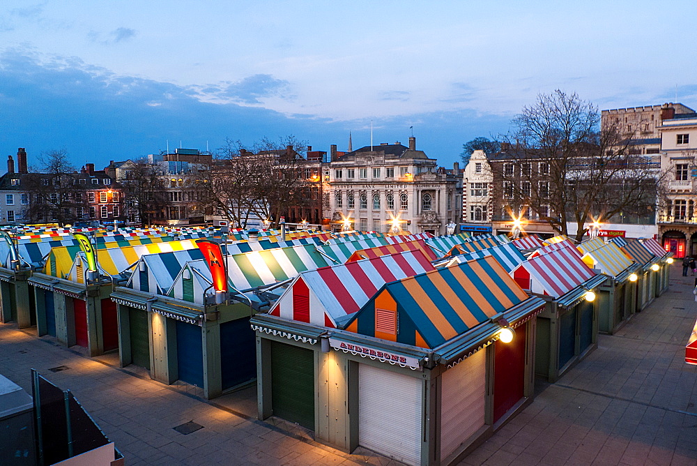 Looking out over the market towards the famous castle at dusk, Norwich, Norfolk, England, United Kingdom, Europe