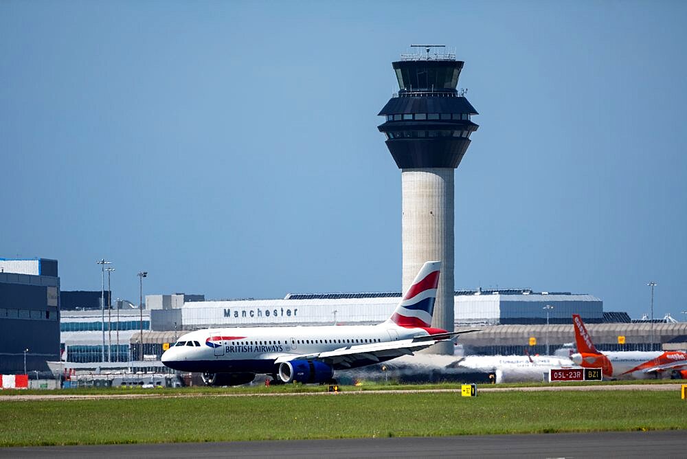 British Airways aircraft landing at Manchester Airport, Manchester, UK