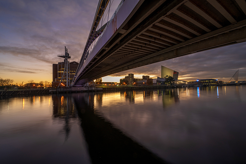 Footbridge and Imperial War Museum North at night, Salford Quays, Manchester