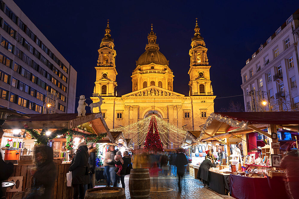 Christmas stalls at night in front of St. Stephen's Basilica in Budapest, Hungary, Europe