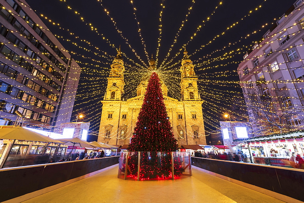 Christmas tree at night in front of St. Stephen's Basilica in Budapest, Hungary, Europe