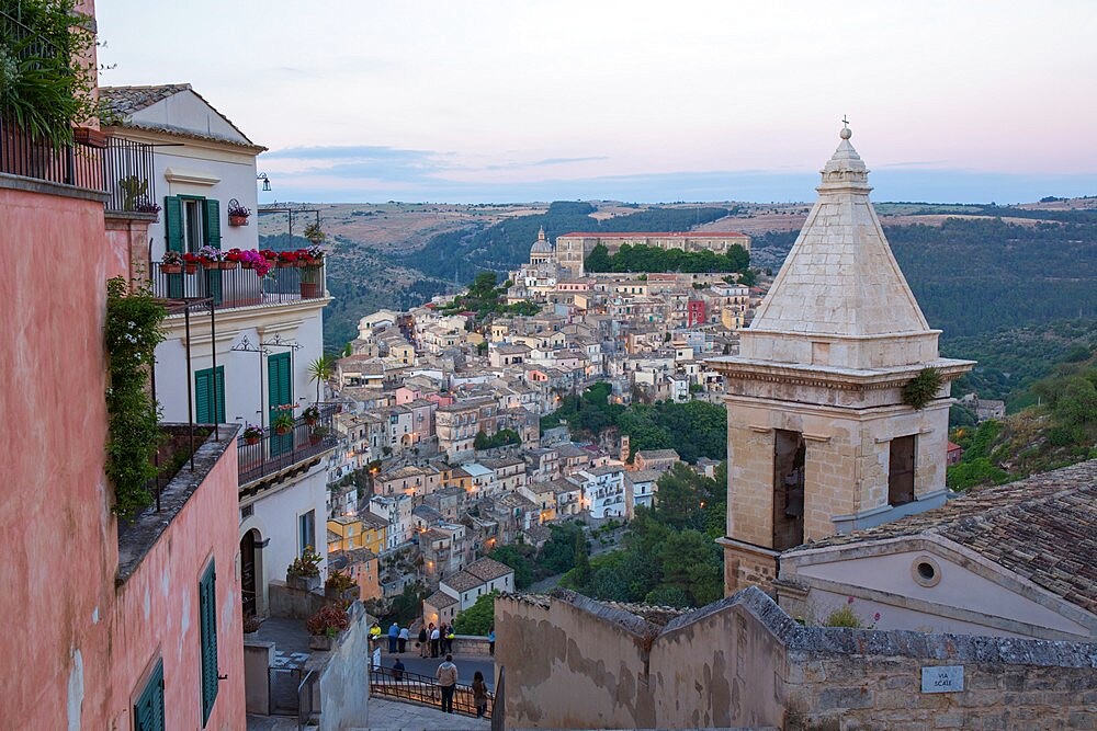 View over Ragusa Ibla, dusk, bell-tower of the Church of Santa Maria delle Scale in foreground, Ragusa, UNESCO World Heritage Site, Sicily, Italy, Europe