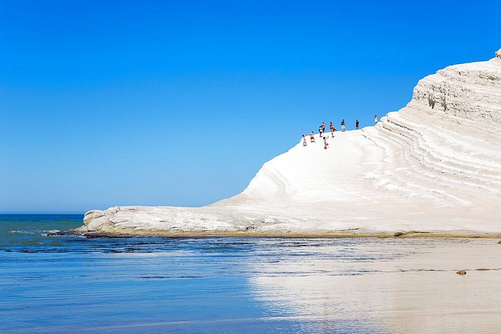 View across calm sea to the white limestone cliffs of the Scala dei Turchi, Realmonte, Porto Empedocle, Agrigento, Sicily, Italy, Mediterranean, Europe