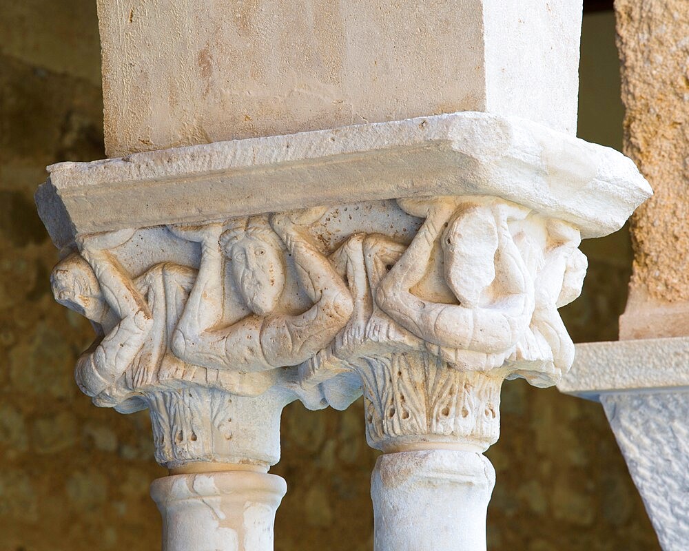 Finely carved capital atop columns in cloister of the Arab-Norman cathedral, UNESCO World Heritage Site, Cefalu, Palermo, Sicily, Italy, Mediterranean, Europe