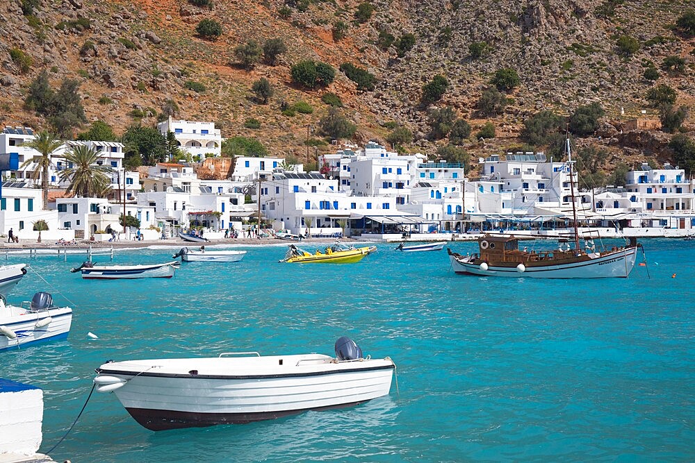 View across the turquoise waters of the harbour, Loutro, Hania (Chania), Crete, Greek Islands, Greece, Europe