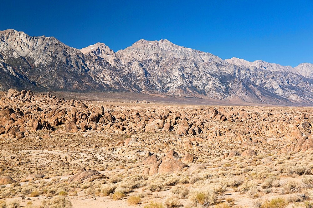 View across rocks to Mount Williamson and the Sierra Nevada, Alabama Hills National Scenic Area, Lone Pine, California, United States of America, North America